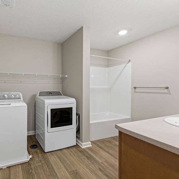 A laundry room with a washer and dryer.
