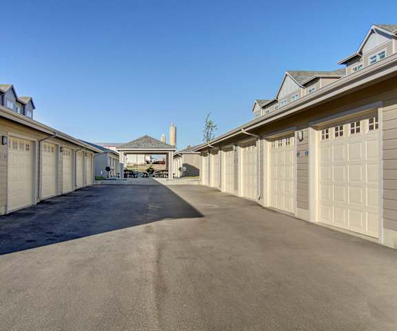 The rentable tan garage units at Prairie Vista Apartment Homes. 