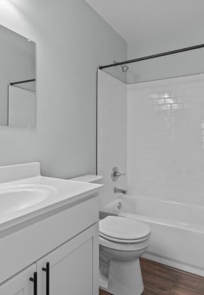 a laundry room with washer and dryer available in select units