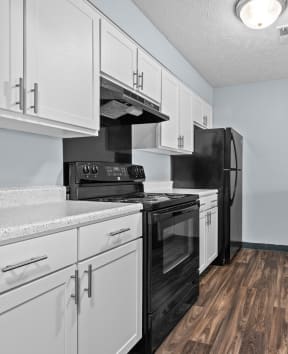 Fully Furnished Kitchen at Fairfax Apartments - Lansing, MI, Michigan, 48917