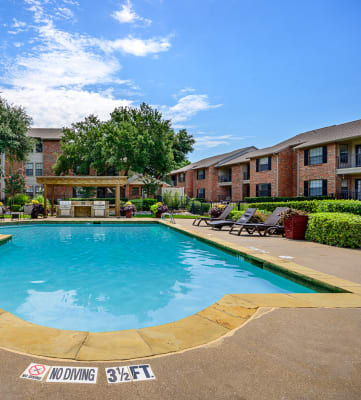 Swimming Pool with Sundeck at Wellington at Willow Bend Apartments, in Plano, TX