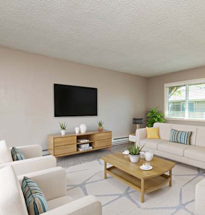 a living room with a couch and a table