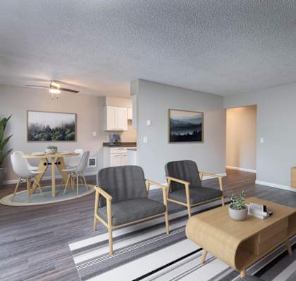 an open living room and dining room with a table and chairs