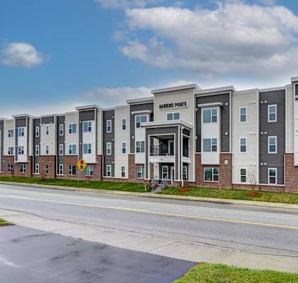 A row of apartment buildings with the name "American North" on the top.