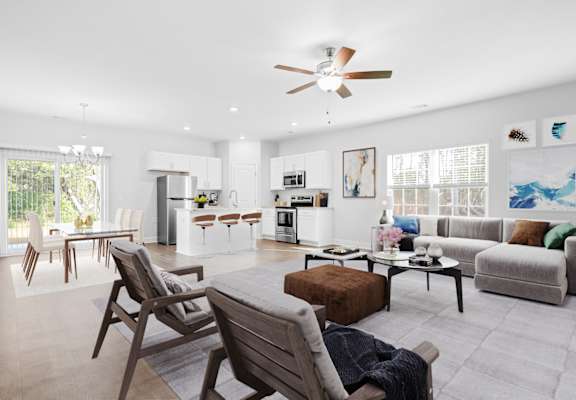 a living room with a couch and a table