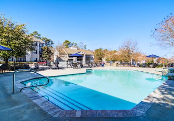the sparkling swimming pool at our apartments