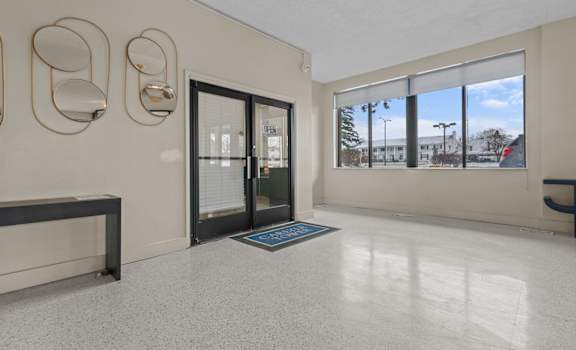 the preserve at ballantyne commons living room with glass doors and windows