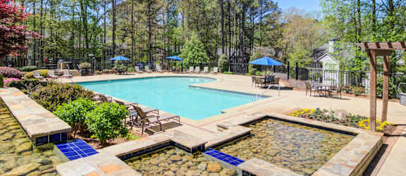 Apartments in Marietta Georgia for Rent – Wood Pointe Apartments - A pool surrounded by trees