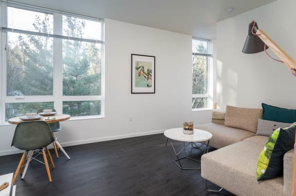 a living room with a couch and a table