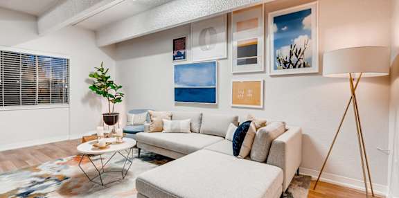 a living room with a couch and a table