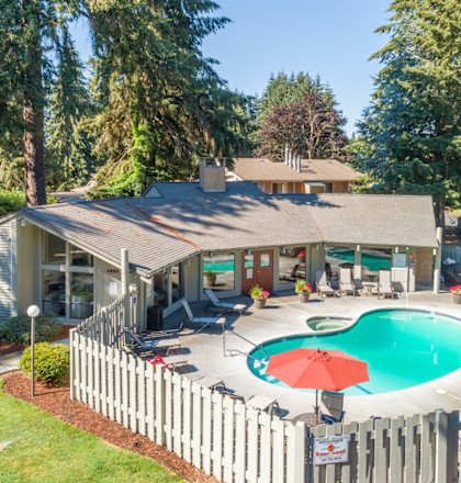 A house with a pool in the backyard.