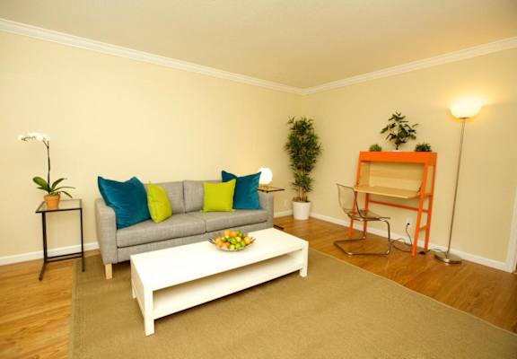 a living room with a couch and a coffee table
