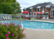 Thumbnail 2 of 37 - Swimming Pool with Lounge Chairs at French Quarter Apartments,Southfield,48034