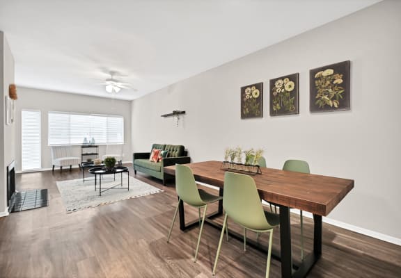Living space with dining  at Augusta Court Apartments, Houston, Texas