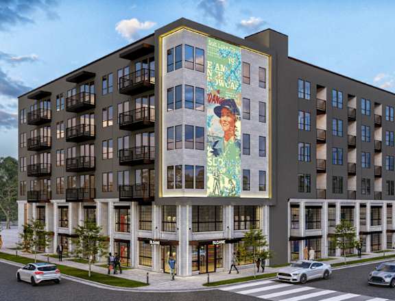 a rendering of an apartment building with a mural on the side of it