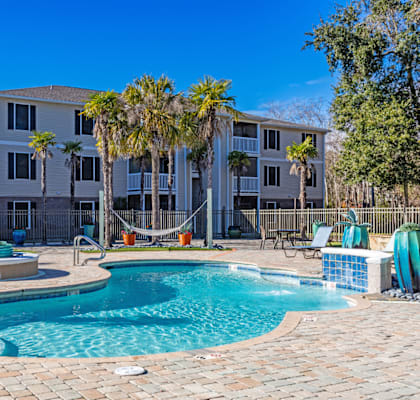 Resort-style swimming pool and sundeck at Grande View Apartments in Biloxi, MS