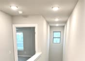 Thumbnail 9 of 60 - B1 (1-car) top of staircase