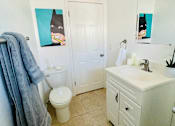 Thumbnail 11 of 16 - staged bathroom