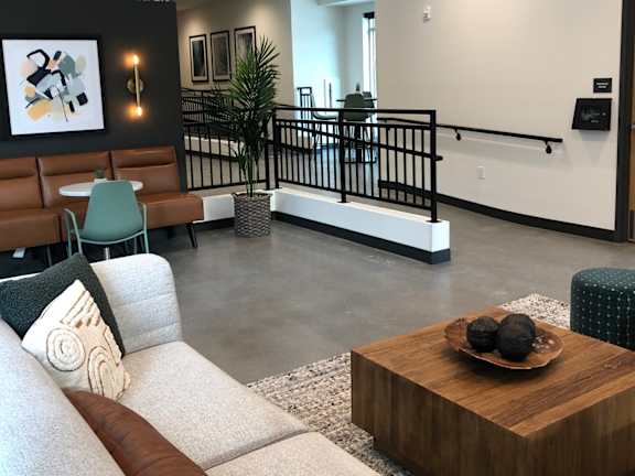 A living room with a couch and a coffee table.