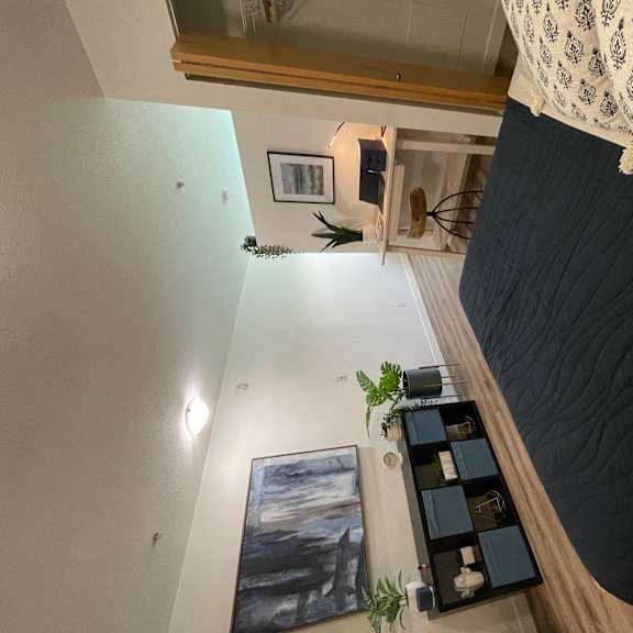 a view of the living room from the loft