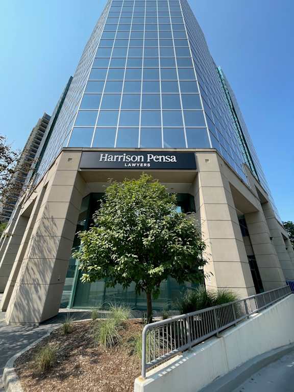 a view of the harrisons pensacola office building from the street