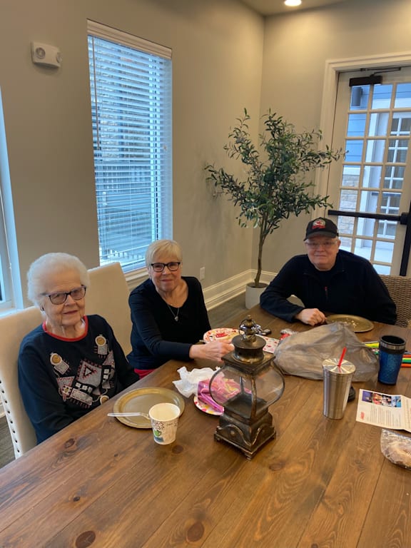three women and a man sitting at a table at LIV at Boerne Hills an Active Senior Community 62+, Boerne, TX