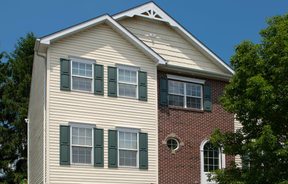 a house with a garage at Holiday Park Apartments, Pittsburgh, PA