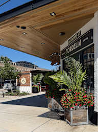 A wooden building with a sign that says Cordelia.