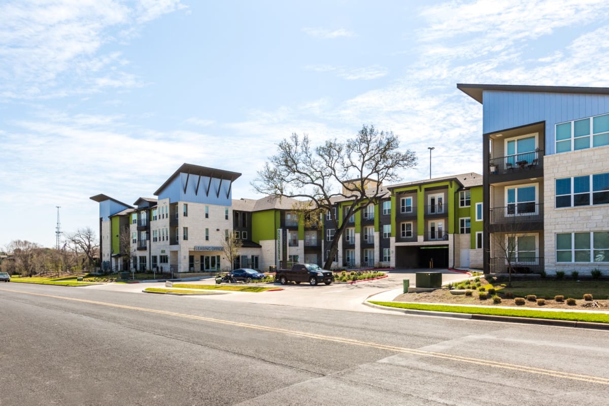 Urban North Apartments exterior at property entrance - Austin, TX