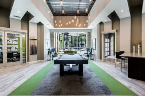 Game lounge with community kitchen and pool table
