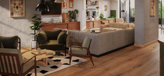 a living room with a couch and chairs and a rug