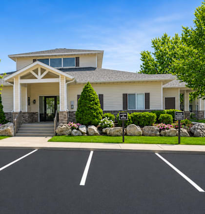 A house with a driveway in front of it.
