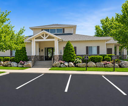 A house with a driveway in front of it.