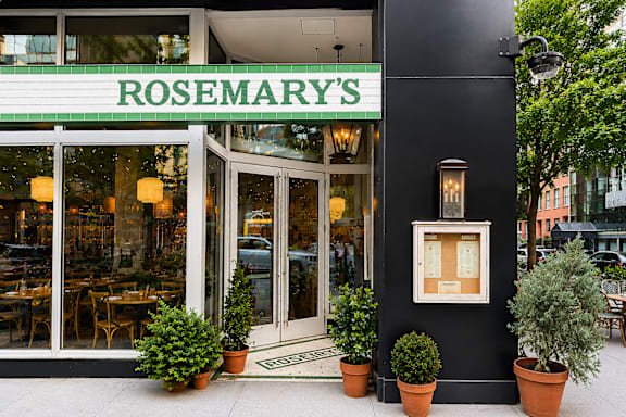 A black and white building with the words "ROSEMARY'S" on the top.