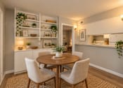 Thumbnail 6 of 11 - A dining room with a round table and chairs at Lifestyle at Shreveport in Shreveport, LA, 71109.