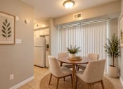 Thumbnail 8 of 11 - A dining room with a table and chairs at Lifestyle at Shreveport in Shreveport, LA, 71109.