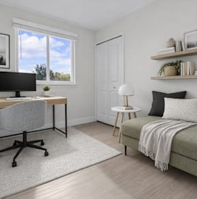 A room with a desk, chair, and bed.