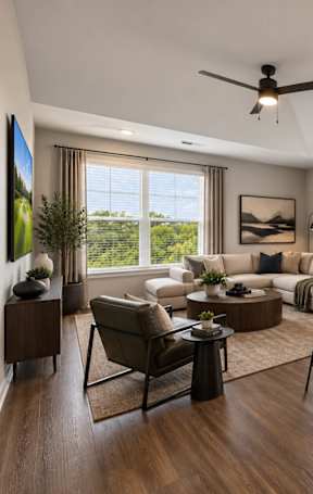 a living room and dining room with a couch and a table