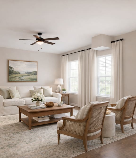 Modern living room with wooden floor and a large painting on the wall at Club Villas Apartments, Kathleen, GA, 31047