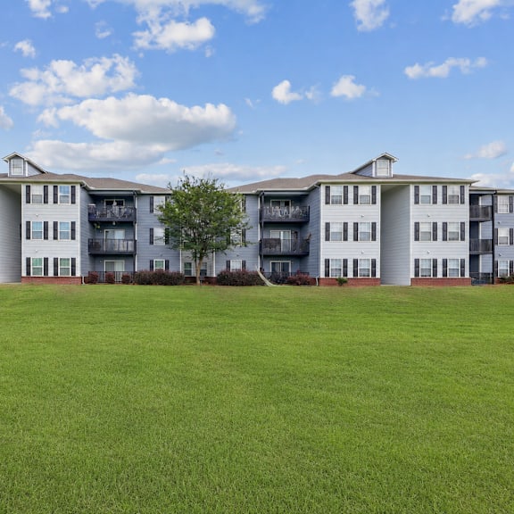 Apartment homes at Lancaster Place Apartments in Calera, Alabama surrounded by open green space in Shelby County near Birmingham.