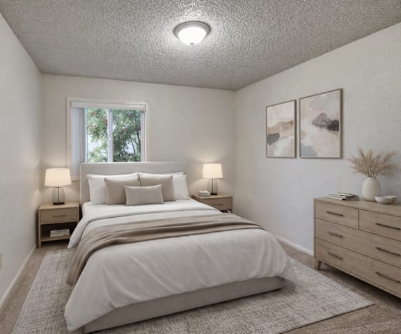 Two empty bedrooms at Arctic Sun Apartments. 