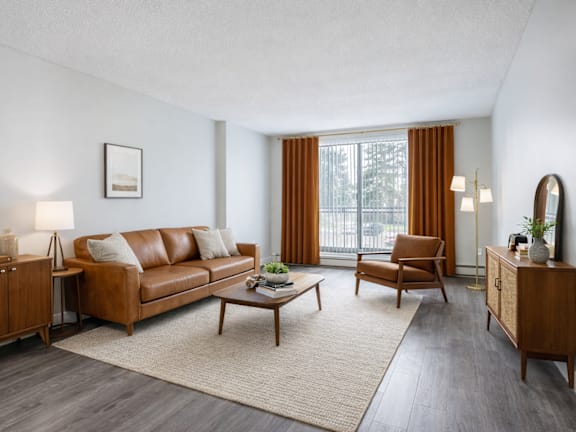 a rendering of a living room with a large window and a dining room in the background