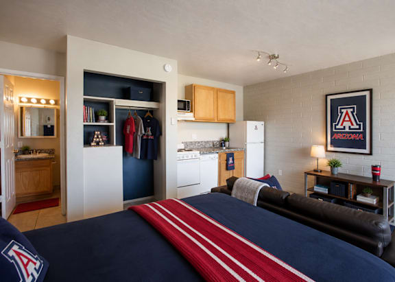 Bedroom & kitchen at University Manor Apartments in Tucson, AZ