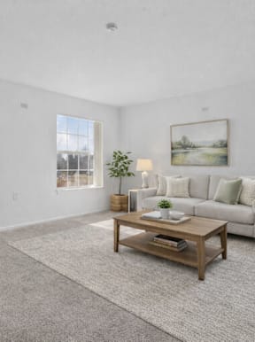 A bedroom with a large bed, a nightstand, and a painting on the wall.