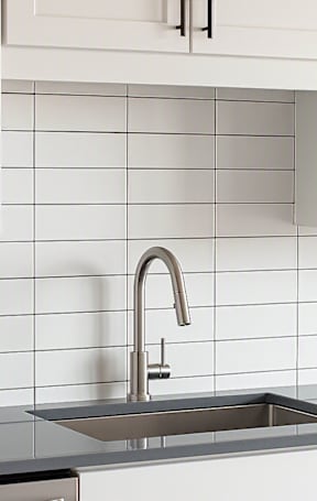 Kitchen with sink and cabinets at The Avery - Residential Apartments, Fargo, ND 58102