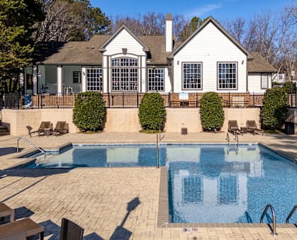 Clear blue shimmering pool view at Radbourne Lake Apartments, Charlotte