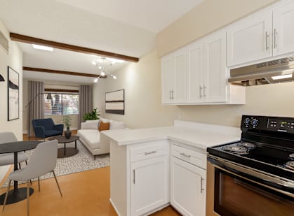 Kitchen with white cabinetry at San Xavier Casitas, Tucson, AZ, 85716