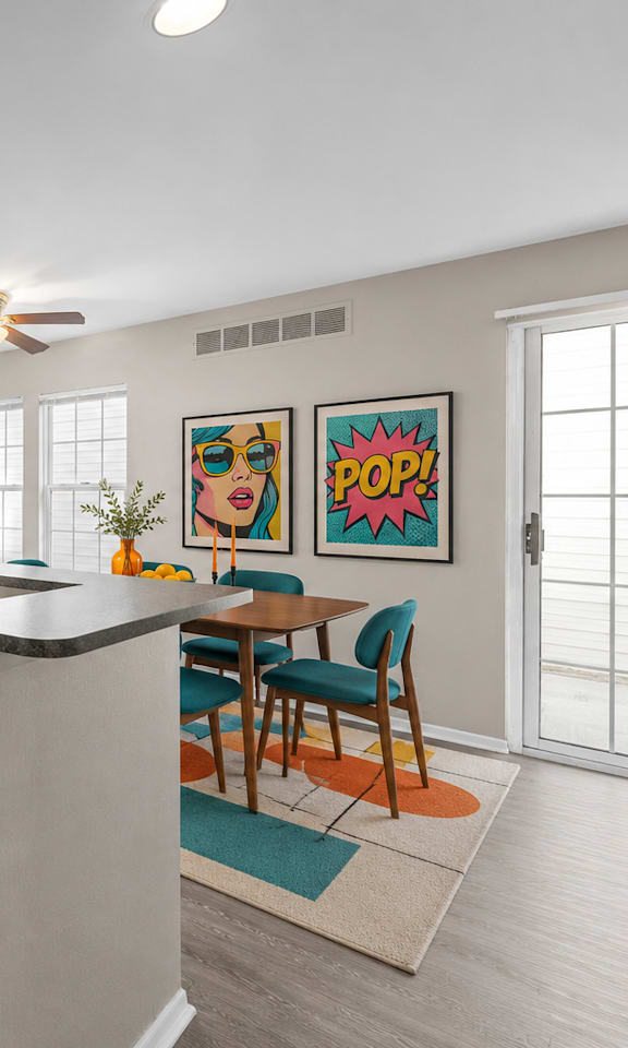 A kitchen with a white refrigerator, wooden cabinets, and a dining table with chairs.