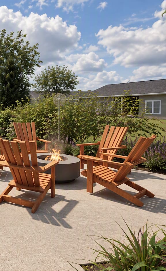 A patio with a grill and chairs is shown.