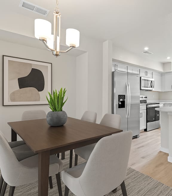 Sophisticated Dining Area With Modern Lighting at The Townhomes at Pine Drive, Parker, CO, Colorado, 80138